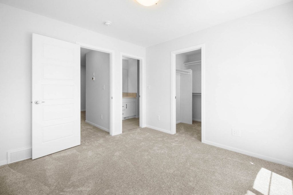 Primary Bedroom with 3-piece ensuite and walk-in closet